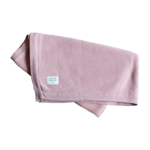 folded organic cotton pink blanket
