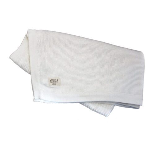 folded organic cotton white blanket