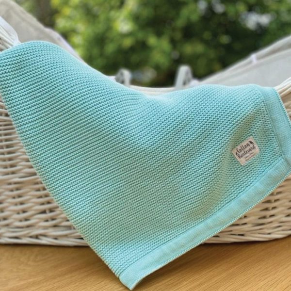 Aqua Organic Cotton Blanket in basket
